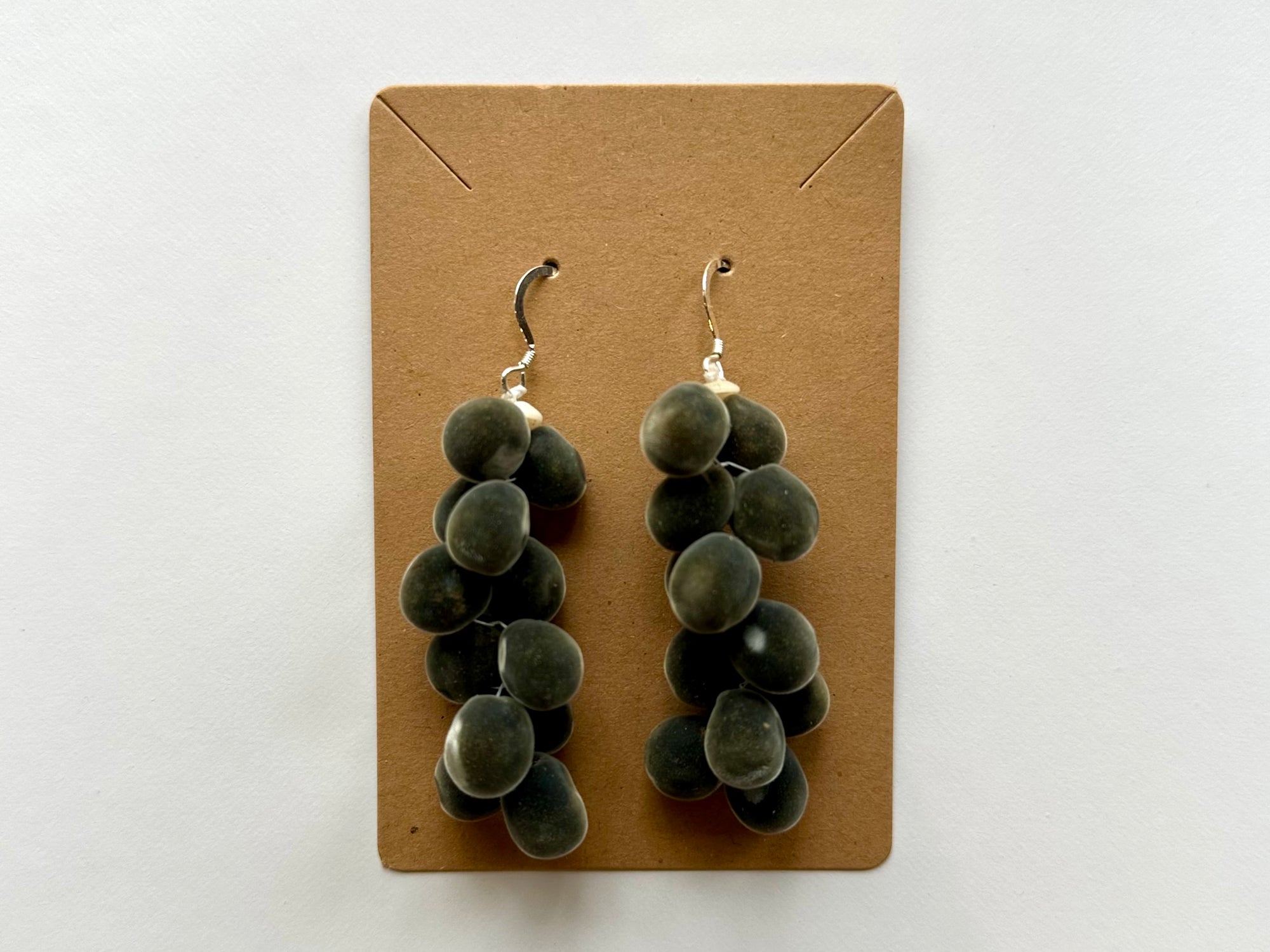 Mario Cervantes: Lana`i puka shells & Mgambo (Velvet) Seed Earrings