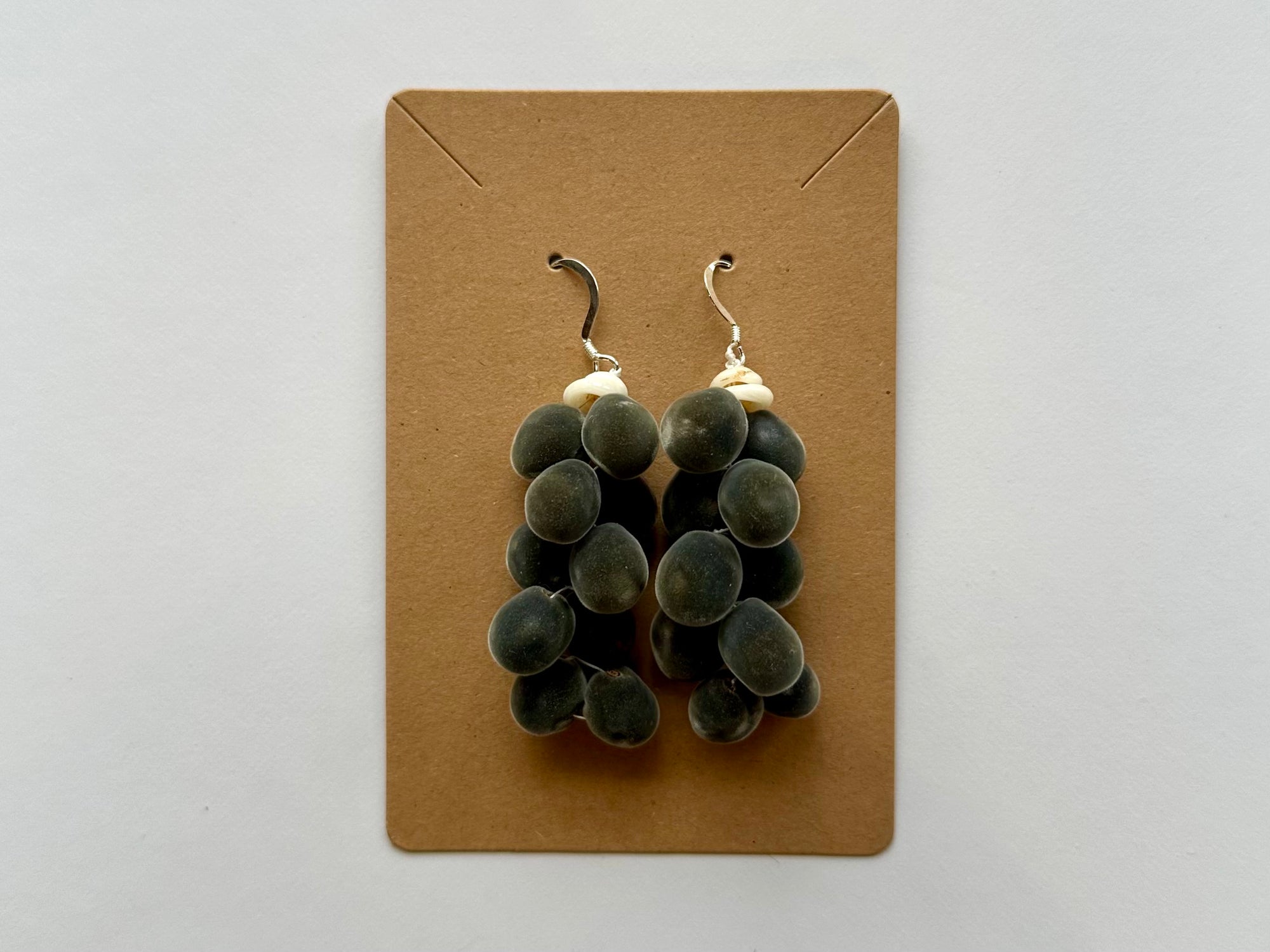 Mario Cervantes: Lana`i puka shells & Mgambo (Velvet) Seed Earrings