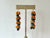 Mario Cervantes: Lana`i Poleho shells & Mgambo (Velvet) Seed Earrings
